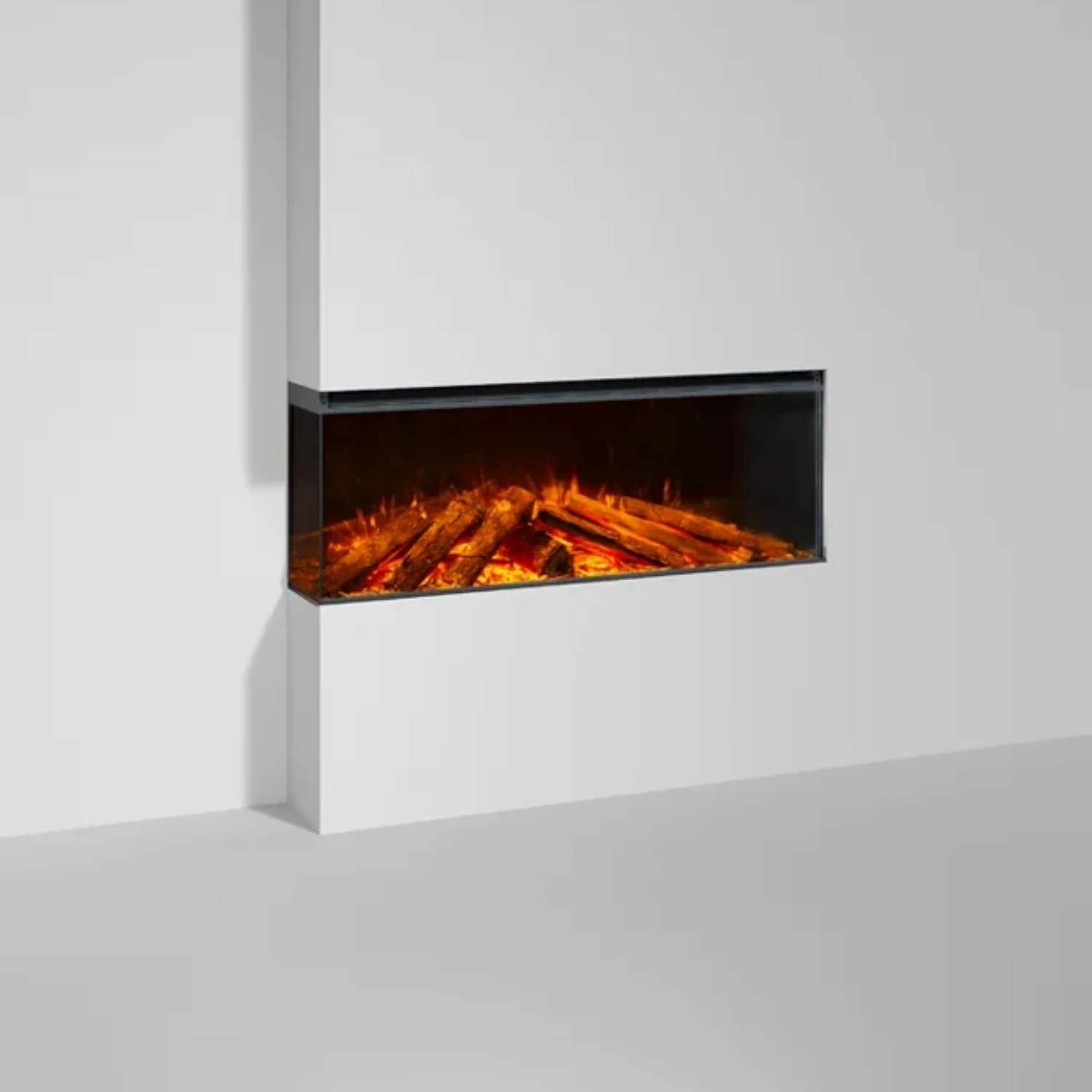 Laissez-vous envelopper par la lueur chaleureuse de l’insert de cheminée électrique Lumen 1200, pour des instants de détente incomparables.